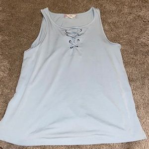 Blue tank, cross strings in front